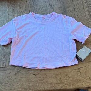 Girls size small Nike Pink Cropped Short Sleeve Tee with White Swoosh